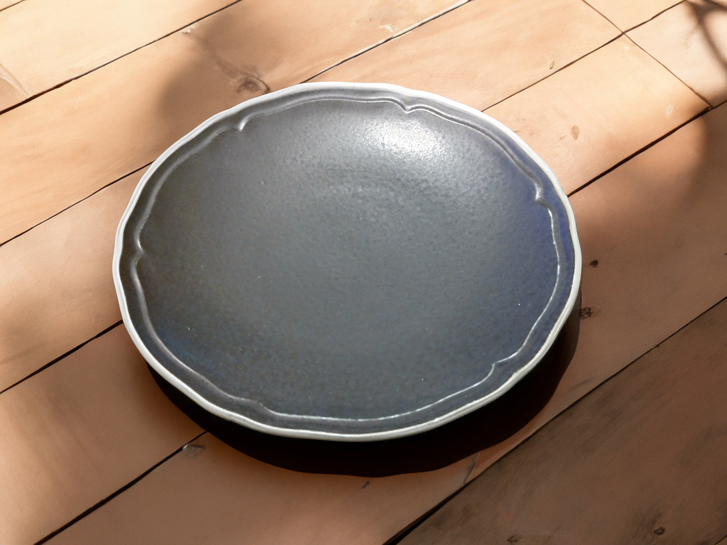 Rinka medium plate black Mino ware